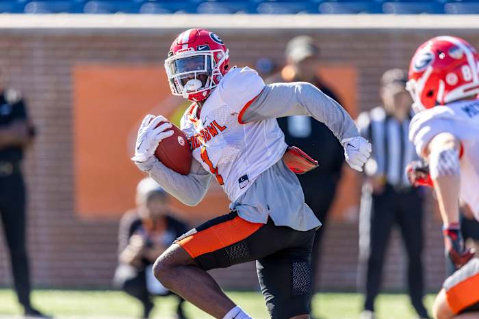 Jan 31, 2024; Mobile, AL, USA; American wide receiver Marcus Rosemy-Jacksaint of Georgia (1) runs the ball after a catch during practice for the American team at Hancock Whitney Stadium.